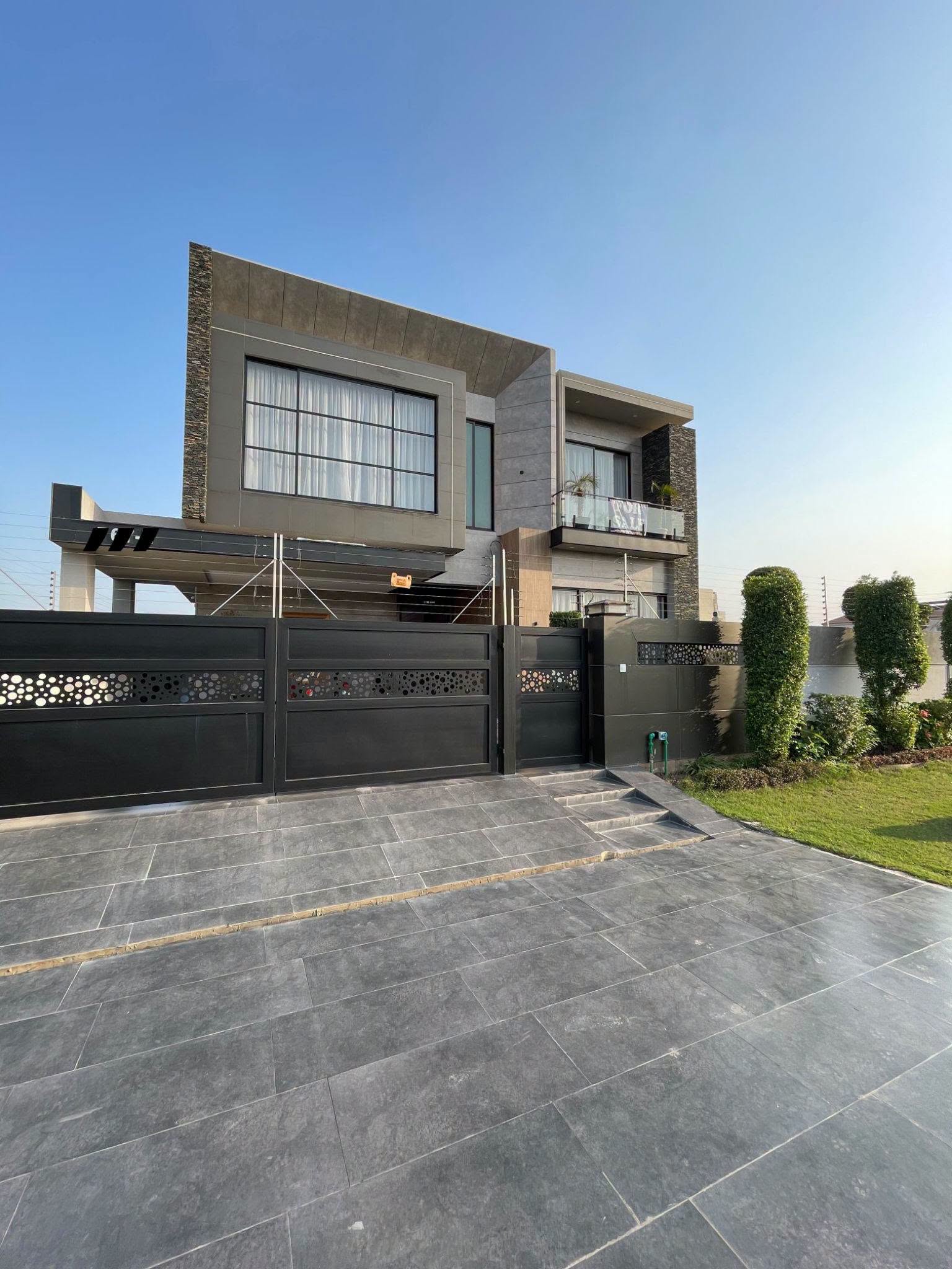 1 Kanal brand new modern house for sale in DHA Phase 8 Block W Lahore - Modern front elevation from the street