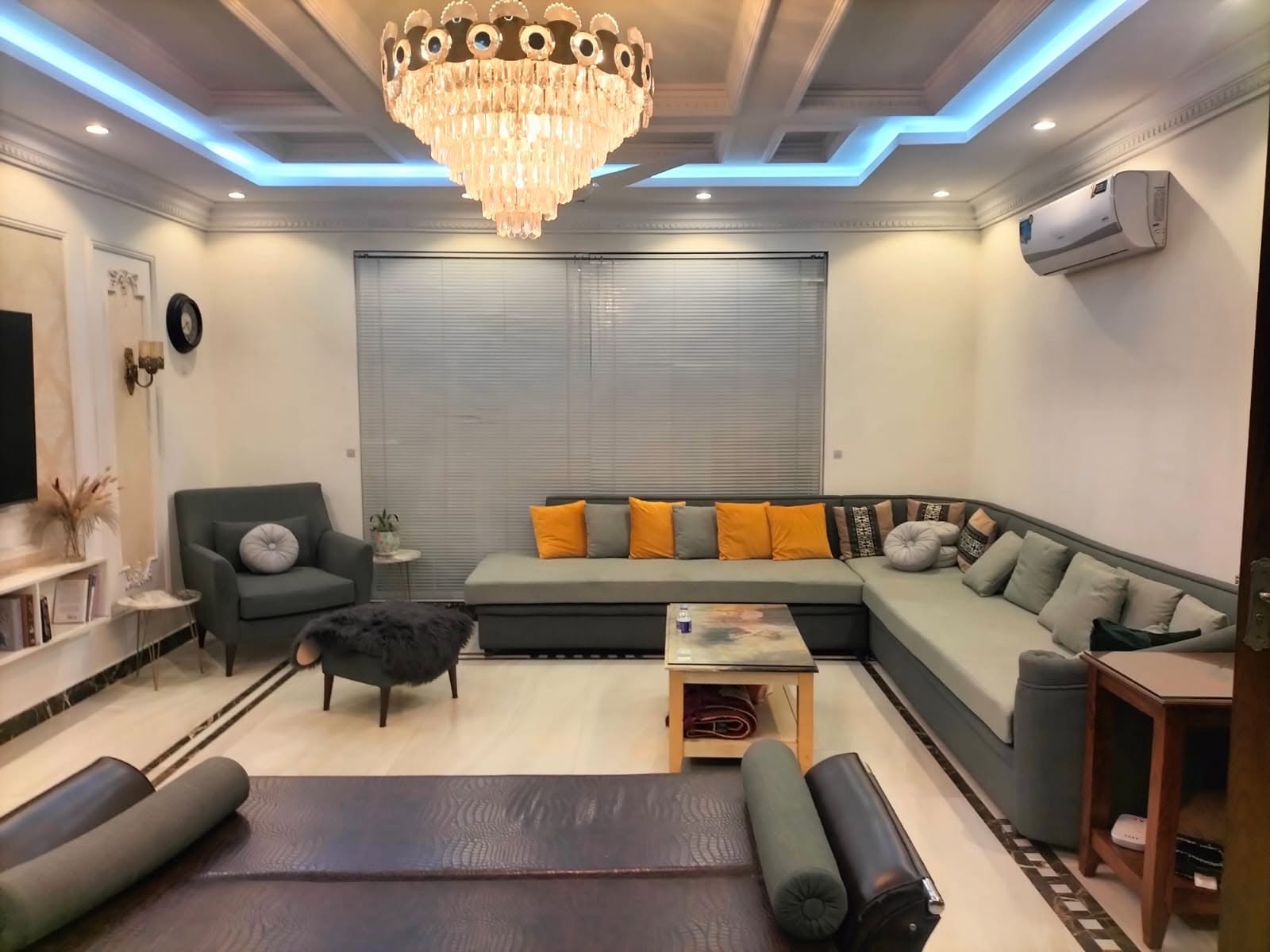 1 Kanal Used House DHA Phase 6 Block C - lounge with chandelier and sofas